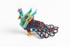 Peacock; small; rainbow colors, turquoise, peacock purple
