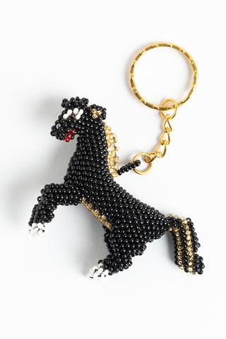 Horse; large; black with gold mane