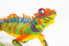 Lizard: large; orange, yellow, green, blue