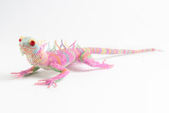 Lizard: large; pink with pale blue, yellow, and green