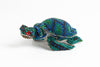 Sea Turtle: small; emerald green, blue, green, black
