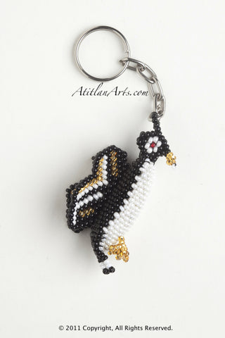 Penguin without chick black with white gold stripe wings [Birds]